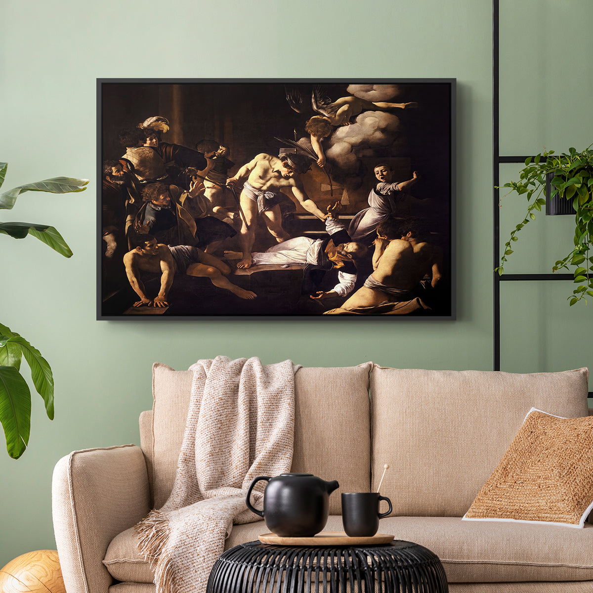 Black floater framed canvas featuring a Baroque composition of movement and emotion during martyrdom, displayed above a sofa in a modern living room.