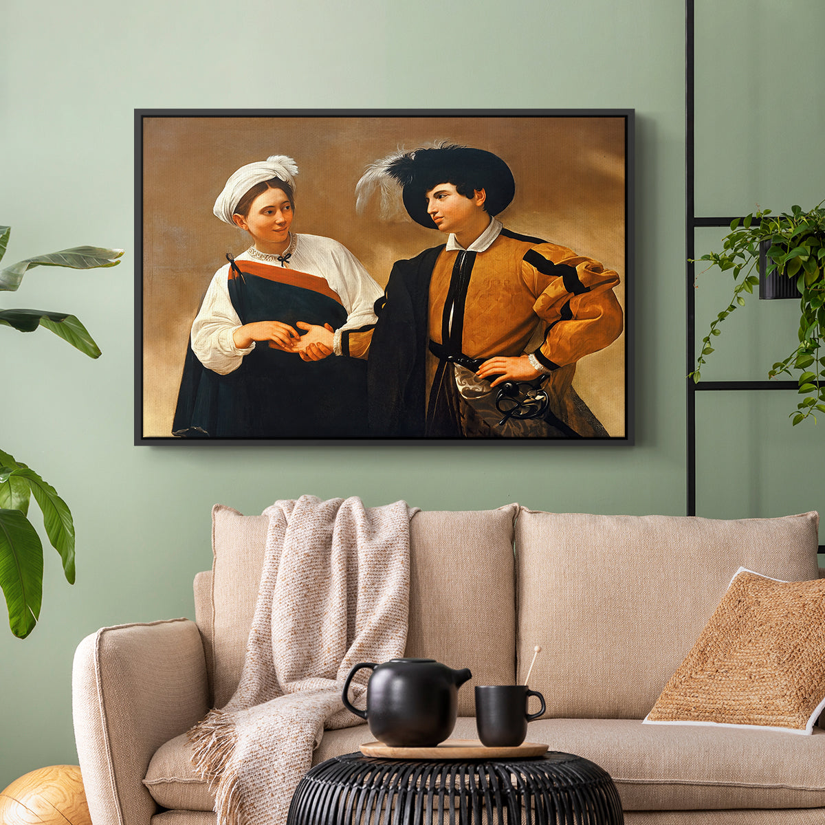 Black floater framed canvas featuring a genre scene of fortune telling with subtle theft, displayed above a sofa in a modern living room.