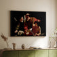Black floater framed canvas of The Sacrifice of Isaac (Uffizi Version), c. 1603 by Caravaggio, featuring a biblical scene of father about to sacrifice son as angel restrains him above a sideboard in a softly lit hallway.