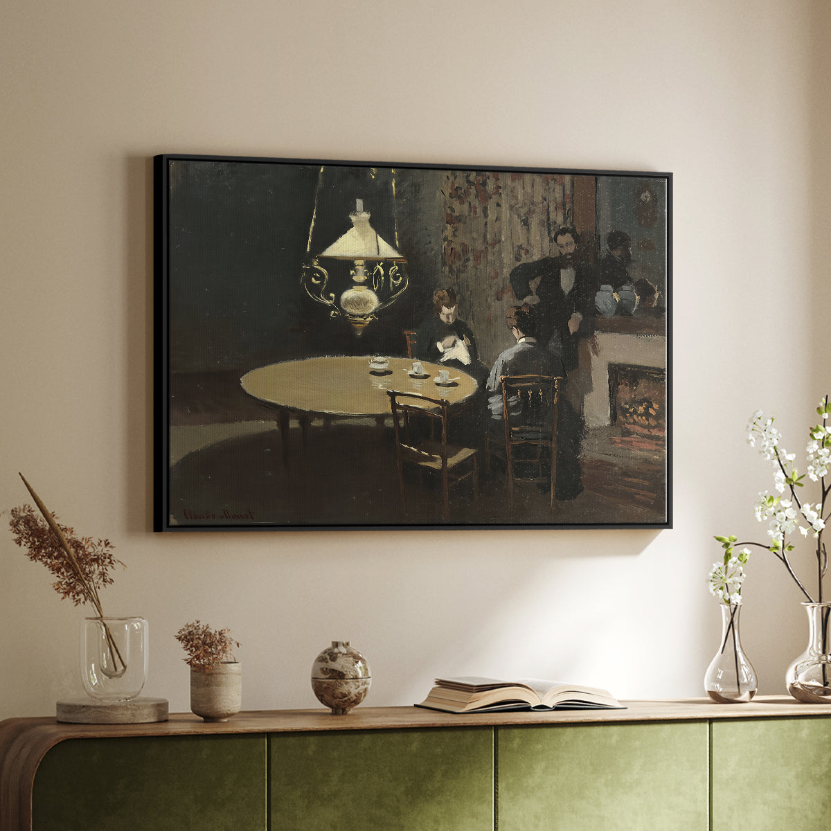 Black floater framed canvas of Interior, after Dinner, 1868-1869 by Claude Monet, featuring a quiet domestic scene with lamp-lit table and subdued atmosphere above a sideboard in a softly lit hallway.