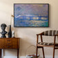 Charing Cross Bridge, 1903 by Claude Monet as a black floater framed canvas featuring an atmospheric depiction of London bridge with reflections in water, styled above a mid-century console in a contemporary living area.