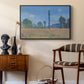 Poppy Field (Giverny), 1890-1891 by Claude Monet as a black floater framed canvas featuring a vibrant meadow scene with flowers and vertical tree forms, styled above a mid-century console in a contemporary living area.