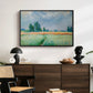 The Wheat Field (Champ de Blé), 1881 by Claude Monet displayed in a black floater framed canvas above a dark wood credenza in an entryway.
