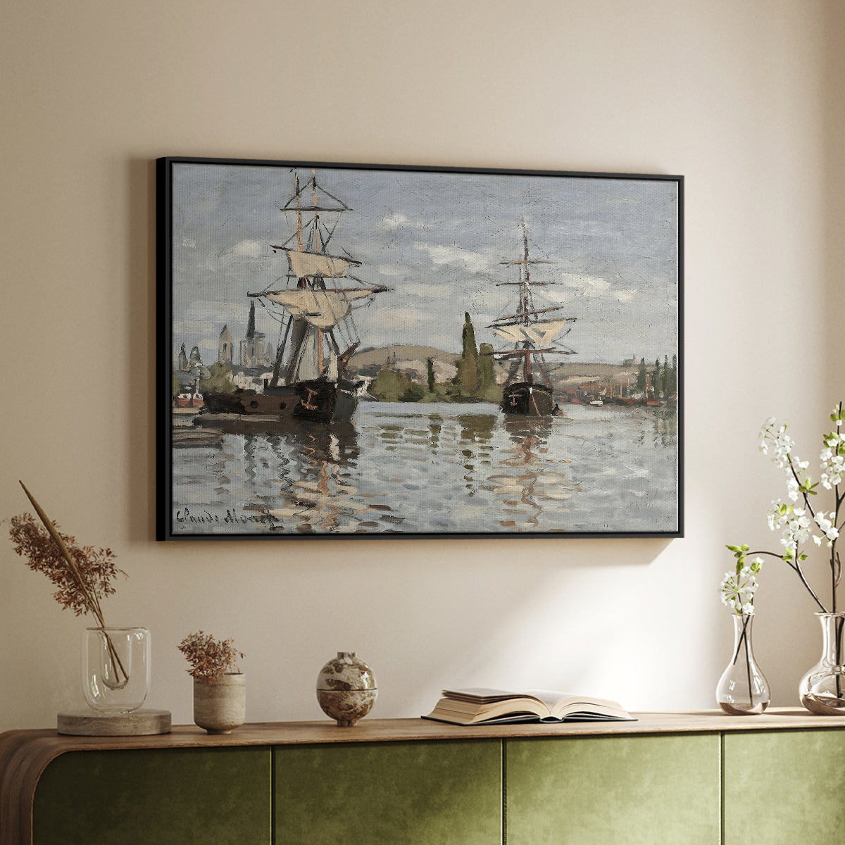 Black floater framed canvas of Ships Riding on the Seine at Rouen, 1872 by Claude Monet, featuring an impressionist river scene with anchored sailing ships and reflections above a sideboard in a softly lit hallway.