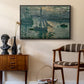 Sunrise (Marine), 1873 by Claude Monet as a black floater framed canvas featuring an early morning harbor scene with boats and diffused light, styled above a mid-century console in a contemporary living area.