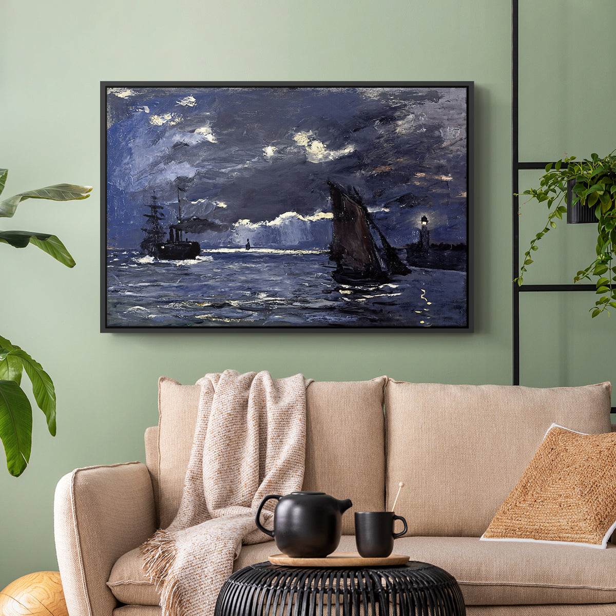 Black floater framed canvas featuring an atmospheric maritime view with ships in moonlit darkness, displayed above a sofa in a modern living room.