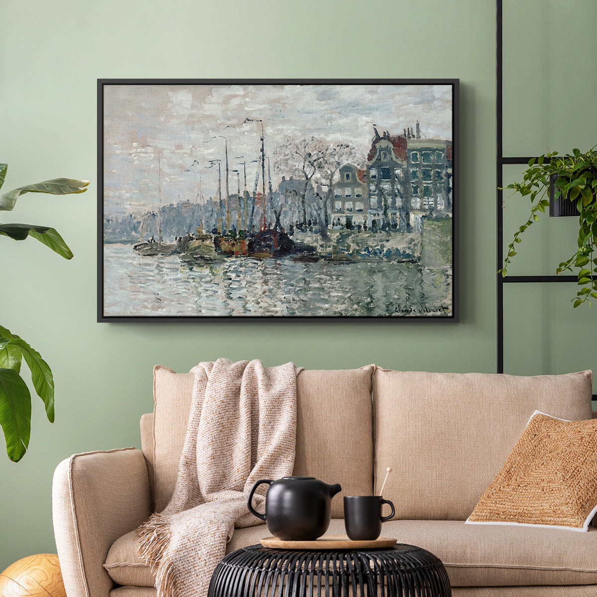 Black floater framed canvas featuring a harbor view with masts, houses, and reflections in water, displayed above a sofa in a modern living room.