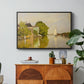 Houses on the Achterzaan, 1871 by Claude Monet in a black floater framed canvas featuring colorful houses reflected in calm river surrounded by greenery, displayed above a wood console cabinet.