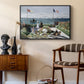 Garden at Sainte-Adresse, 1867 by Claude Monet as a black floater framed canvas featuring a vibrant garden scene with colorful blooms and distant sea, styled above a mid-century console in a contemporary living area.