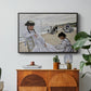 On the Beach at Trouville, 1870 by Claude Monet in a black floater framed canvas featuring figures seated on beach with parasols facing the ocean, displayed above a wood console cabinet.