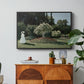 Woman in the Garden, Sainte-Adresse, 1867 by Claude Monet in a black floater framed canvas featuring a woman standing in garden surrounded by flowers and greenery, displayed above a wood console cabinet.