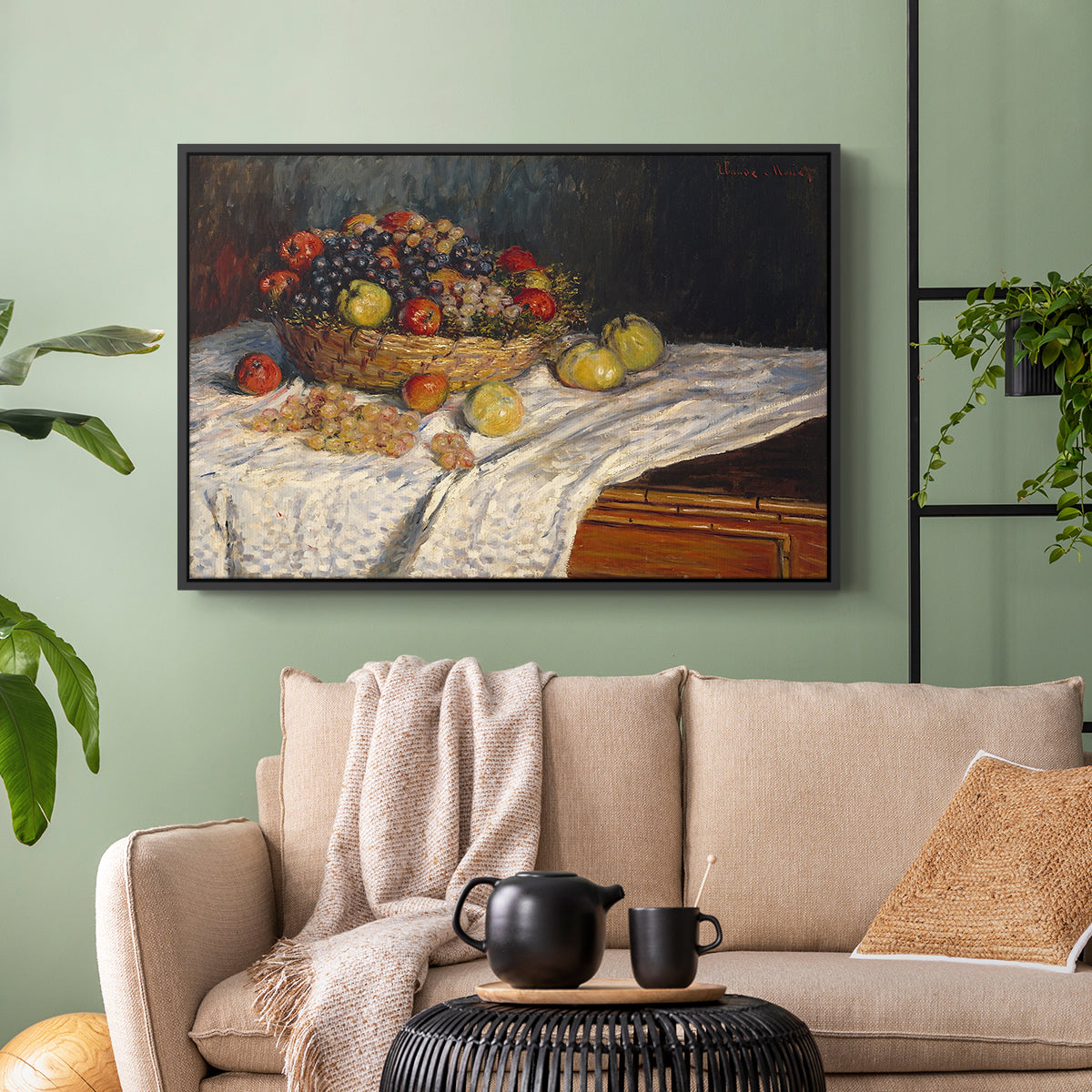 Black floater framed canvas featuring a tabletop composition with fruit and subtle shadows, displayed above a sofa in a modern living room.
