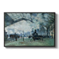 The Saint-Lazare Station, 1877 by Claude Monet in a black floater framed canvas wall art display.