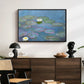 Water Lilies (Nymphéas), 1897-1899 by Claude Monet displayed in a black floater framed canvas above a dark wood credenza in an entryway.