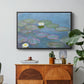 Water Lilies (Nymphéas), 1897-1899 by Claude Monet in a black floater framed canvas featuring floating water lilies on pond with reflections of sky and foliage, displayed above a wood console cabinet.