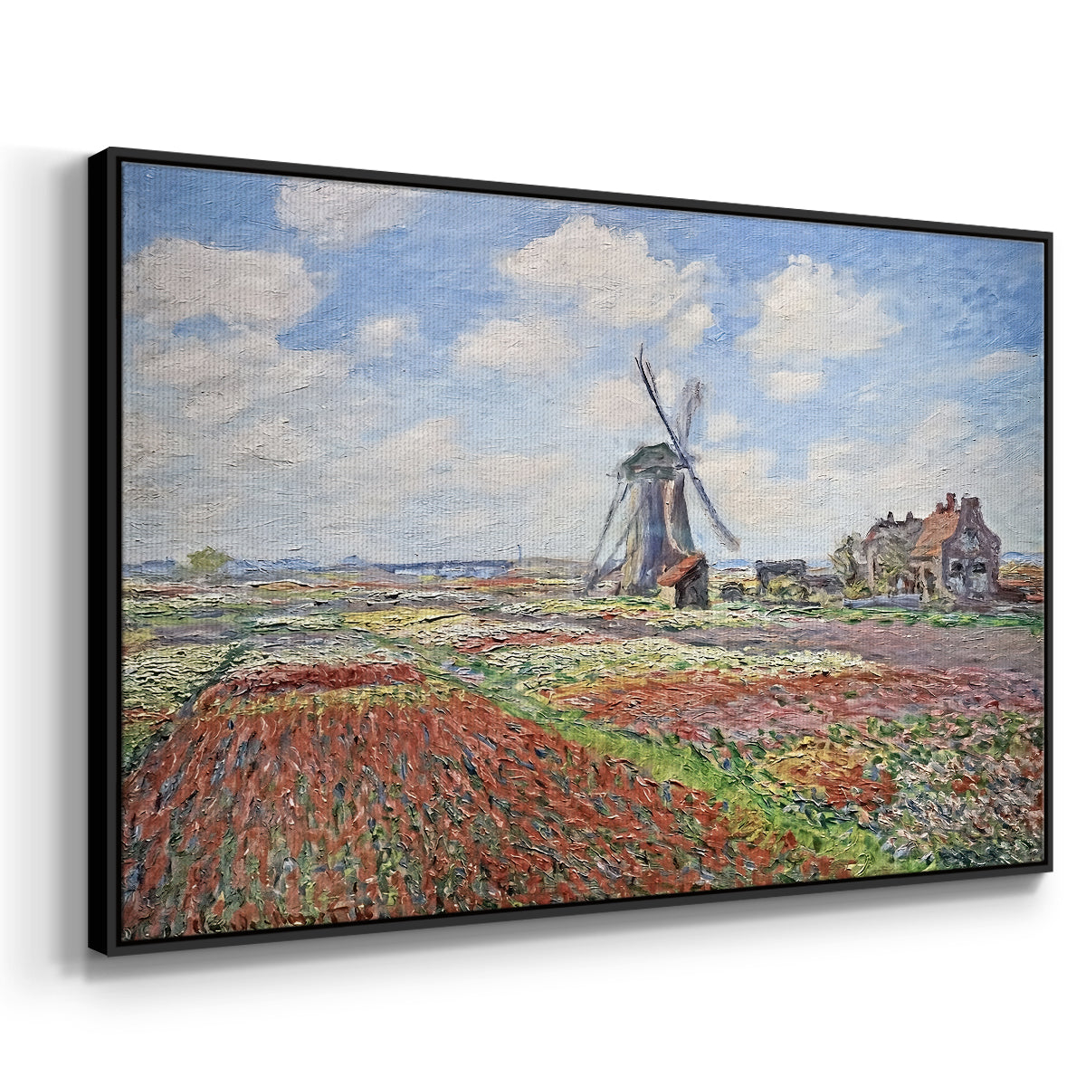 Angled view of Tulip Fields with the Rijnsburg Windmill, 1886 by Claude Monet in a black floater framed canvas.