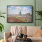 Black floater framed canvas featuring a rural scene with patterned rows of flowers and windmill, displayed above a sofa in a modern living room.