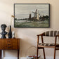 Windmill at Zaandam, 1871 by Claude Monet as a black floater framed canvas featuring a rustic scene with windmill and reflections in water, styled above a mid-century console in a contemporary living area.