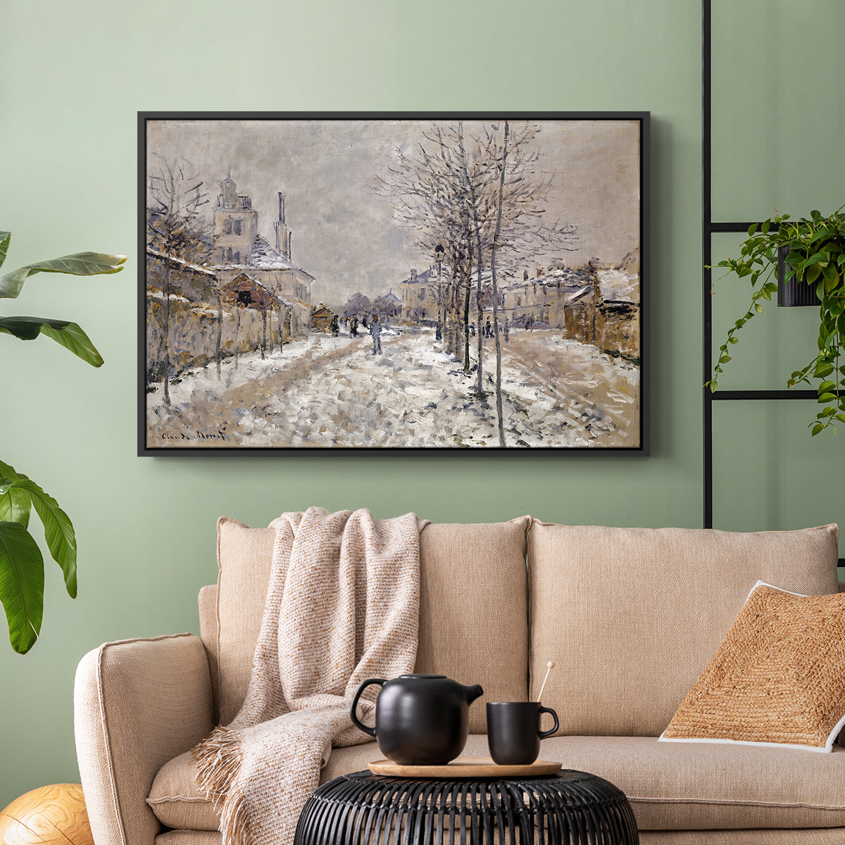 Black floater framed canvas featuring an urban winter landscape with muted tones and soft light, displayed above a sofa in a modern living room.