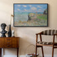 The Cliff Walk at Pourville, 1882 by Claude Monet as a black floater framed canvas featuring a coastal cliff scene with grass, wind, and expansive sea view, styled above a mid-century console in a contemporary living area.