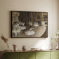Black floater framed canvas of The Rehearsal of the Ballet Onstage, 1874 by Edgar Degas, featuring a stage rehearsal scene with dancers preparing performance above a sideboard in a softly lit hallway.