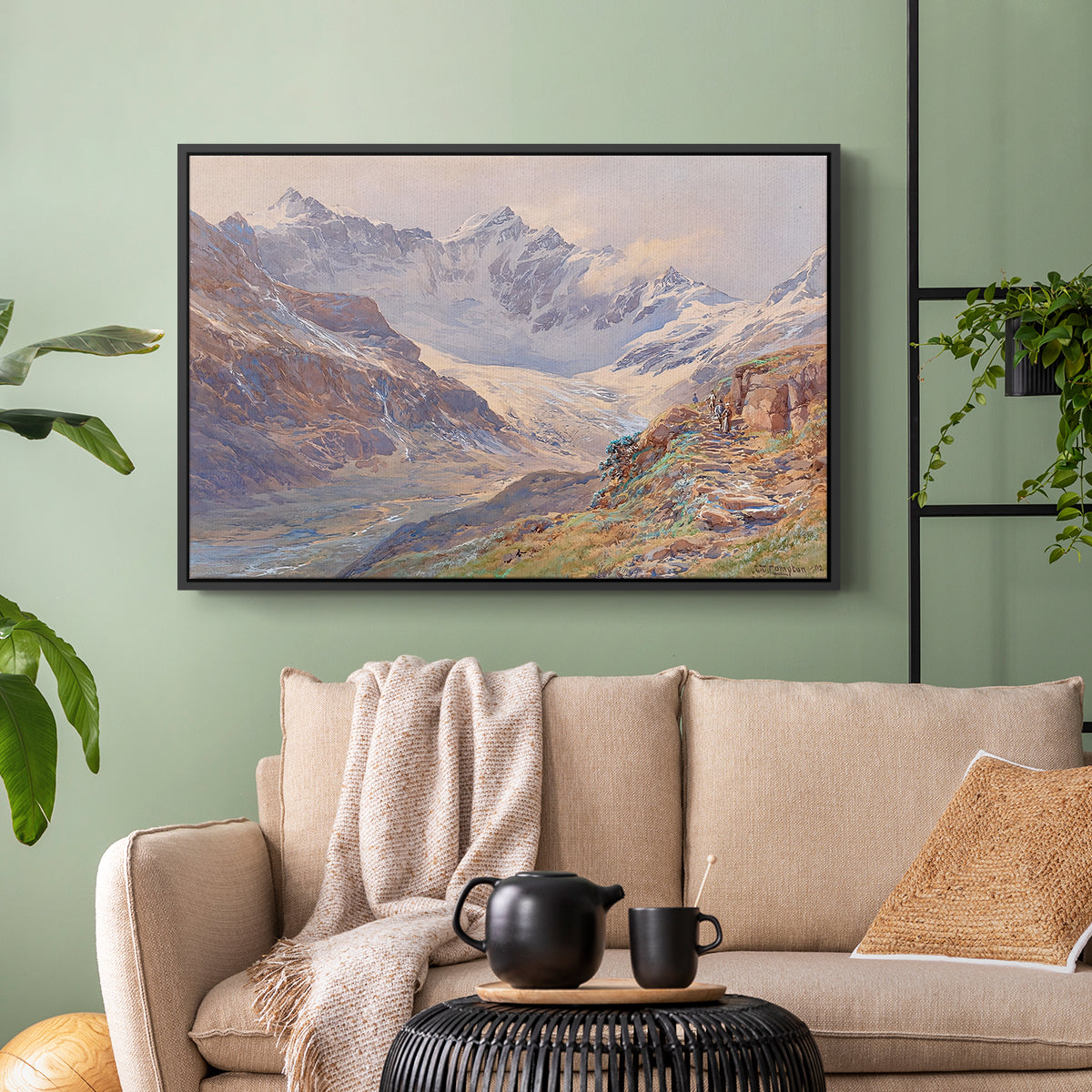 Black floater framed canvas featuring an expansive alpine view with ice and distant mountains, displayed above a sofa in a modern living room.
