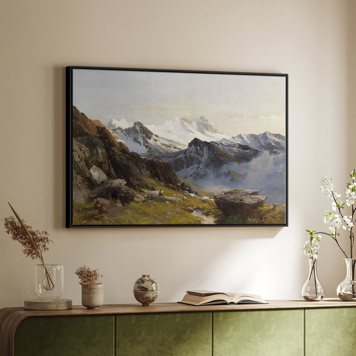 Black floater framed canvas of The Großglockner from the Prager Hut, 1890 by Edward Theodore Compton, featuring a mountain summit seen from elevated viewpoint with surrounding landscape above a sideboard in a softly lit hallway.