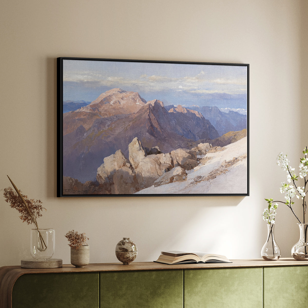 Black floater framed canvas of Hoher Göll from Watzmann-Hocheck, 1919 by Edward Theodore Compton, featuring an alpine panorama showing layered peaks and valleys above a sideboard in a softly lit hallway.