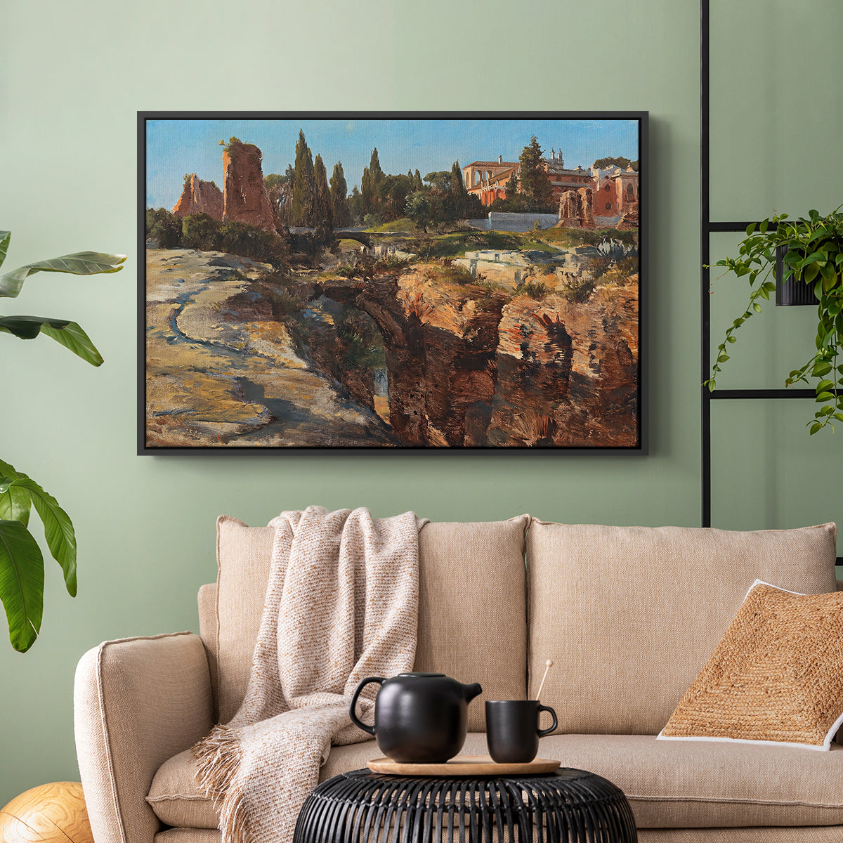 Black floater framed canvas featuring a detailed depiction of historic Roman architecture, displayed above a sofa in a modern living room.