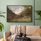 Black floater framed canvas featuring a realistic depiction of remote mountain environment, displayed above a sofa in a modern living room.