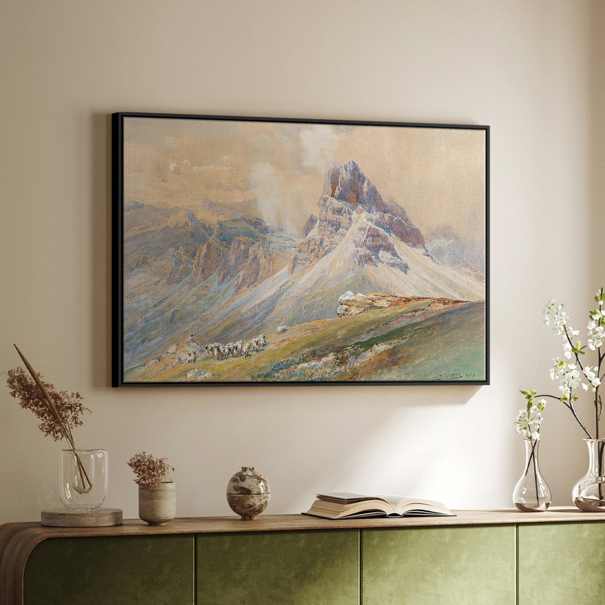 Black floater framed canvas of From the Dolomites, 1904 by Edward Theodore Compton, featuring an alpine scene with jagged rock formations and distant mountains above a sideboard in a softly lit hallway.