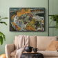 Black floater framed canvas featuring an architectural scene with houses arranged in curved composition, displayed above a sofa in a modern living room.