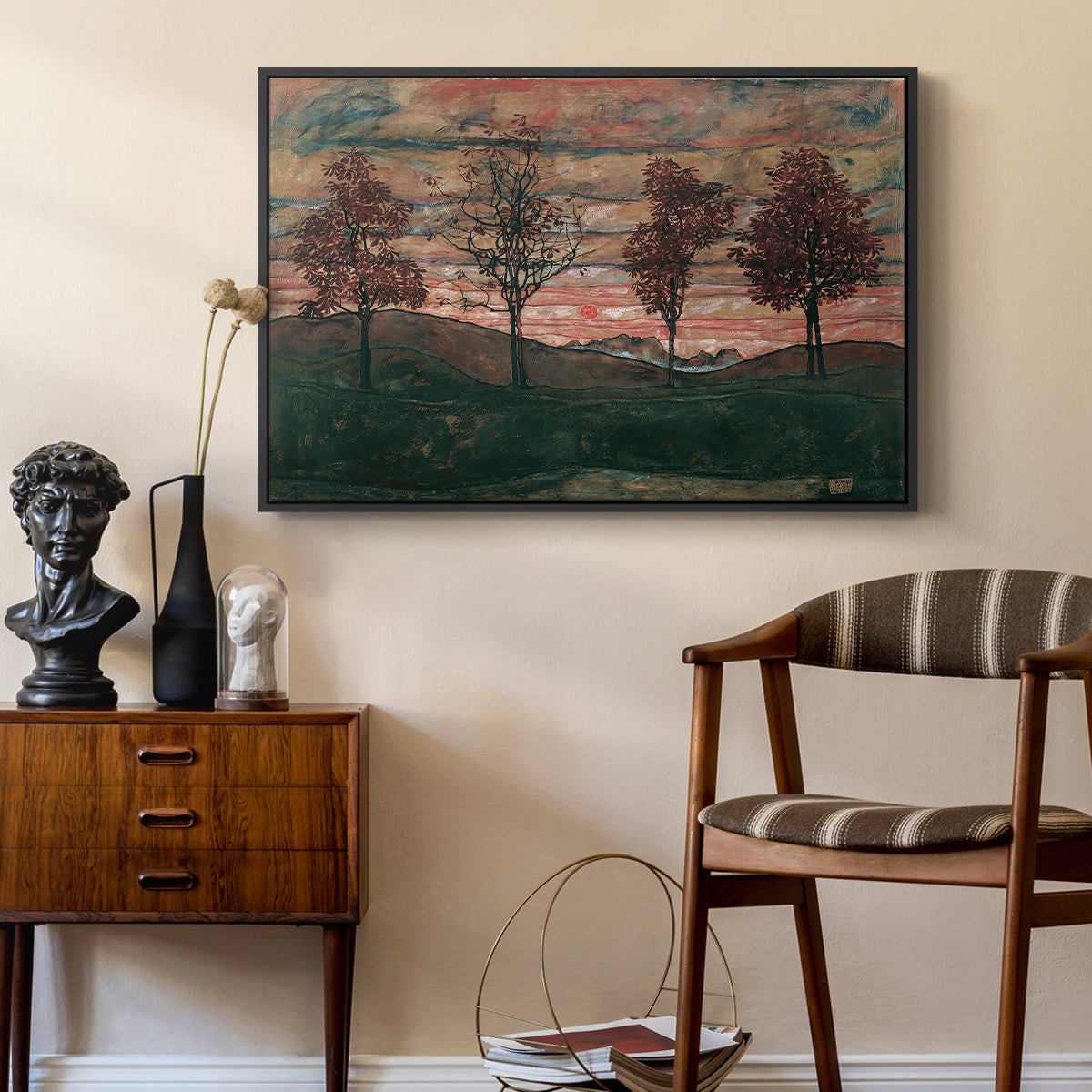 Four Trees, 1917 by Egon Schiele as a black floater framed canvas featuring a stylized nature scene with strong outlines and simple composition, styled above a mid-century console in a contemporary living area.