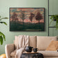 Black floater framed canvas featuring an expressionist landscape featuring isolated trees in field, displayed above a sofa in a modern living room.