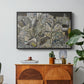 Mödling II, 1918 by Egon Schiele in a black floater framed canvas featuring clustered geometric houses forming dense urban landscape with sharp angles, displayed above a wood console cabinet.