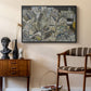 Mödling II, 1918 by Egon Schiele as a black floater framed canvas featuring an abstracted town view with angular rooftops and fragmented forms, styled above a mid-century console in a contemporary living area.