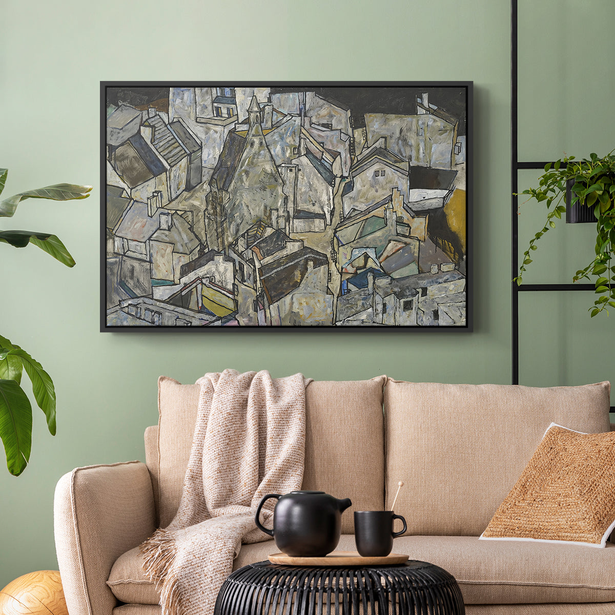 Black floater framed canvas featuring a stylized urban composition with geometric structures and muted tones, displayed above a sofa in a modern living room.