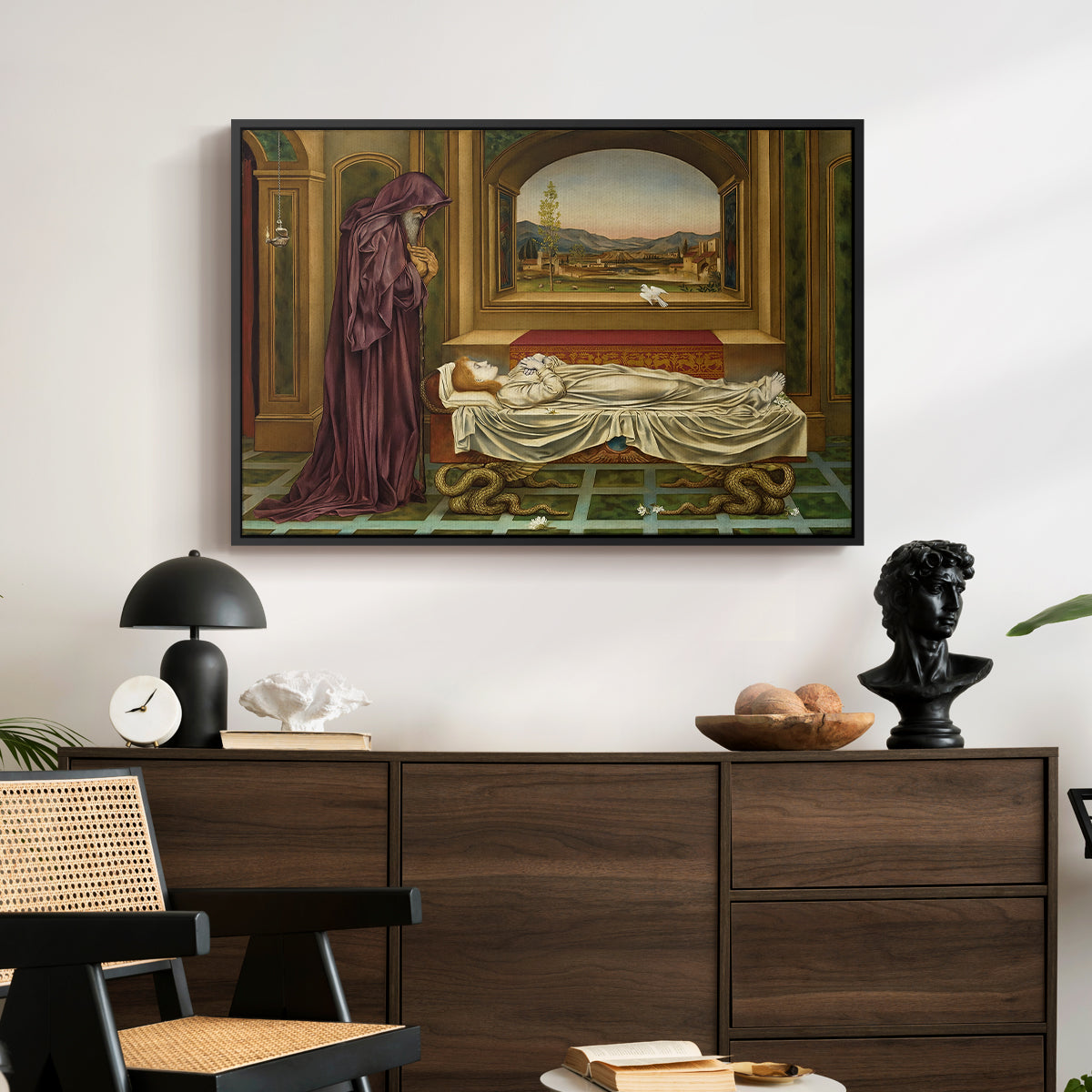 The Wandering Jew: Whom the Gods Love Die Young, 1888 by Evelyn De Morgan displayed in a black floater framed canvas above a dark wood credenza in an entryway.