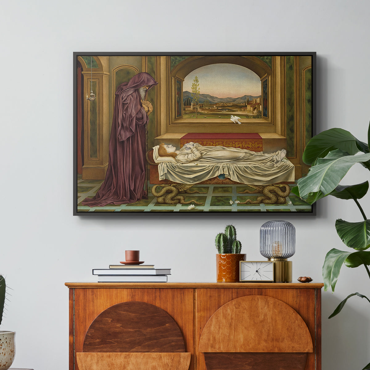The Wandering Jew: Whom the Gods Love Die Young, 1888 by Evelyn De Morgan in a black floater framed canvas featuring a solitary figure standing in interior space with contemplative expression, displayed above a wood console cabinet.