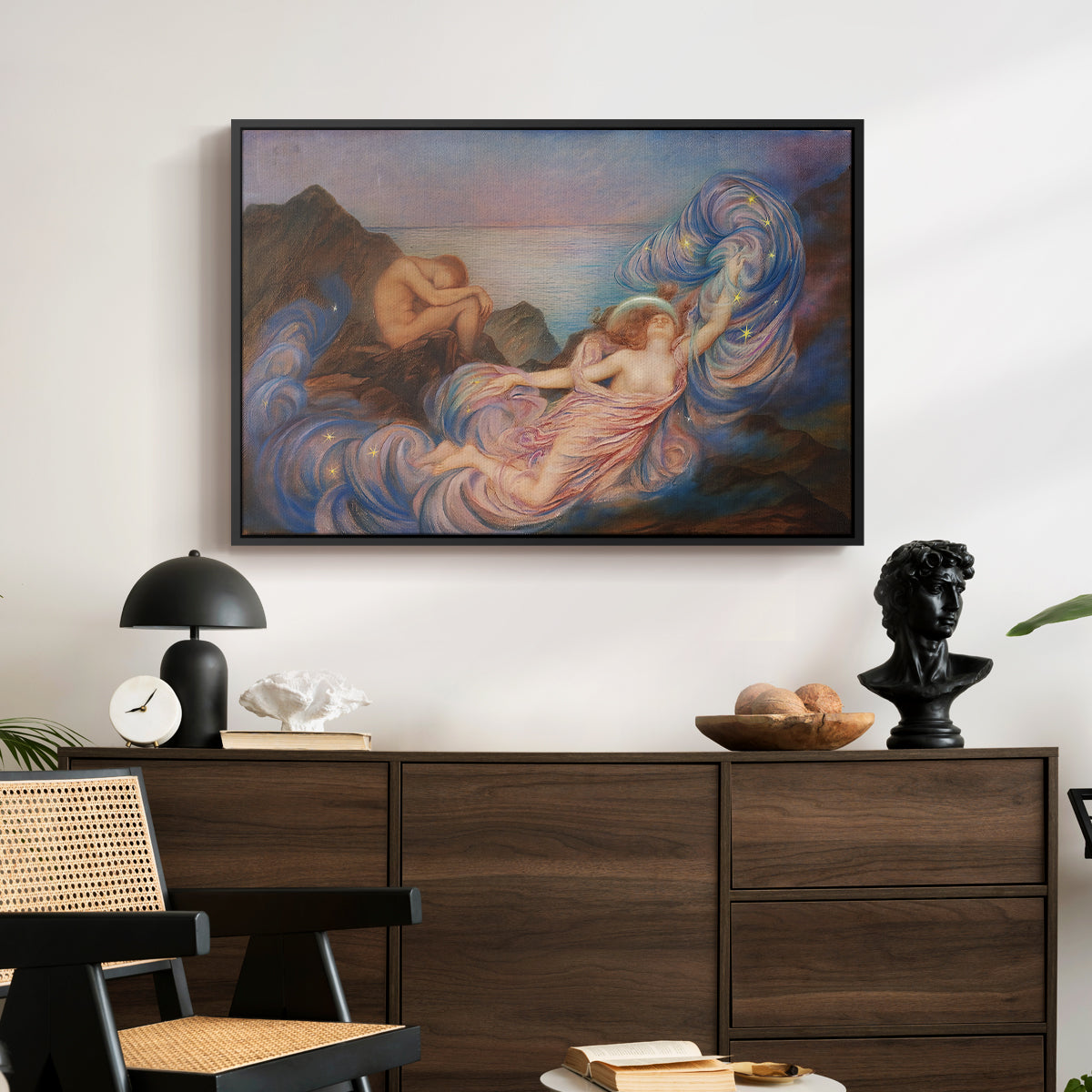 Twilight, 1914 by Evelyn De Morgan displayed in a black floater framed canvas above a dark wood credenza in an entryway.