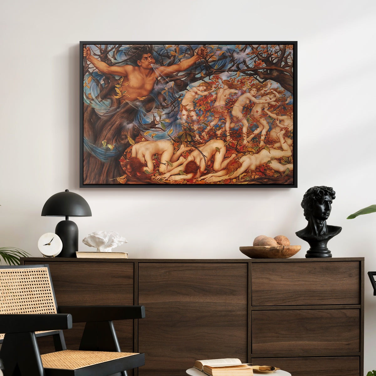 Boreas and the Fallen Leaves, c. 1910-1914 by Evelyn De Morgan displayed in a black floater framed canvas above a dark wood credenza in an entryway.