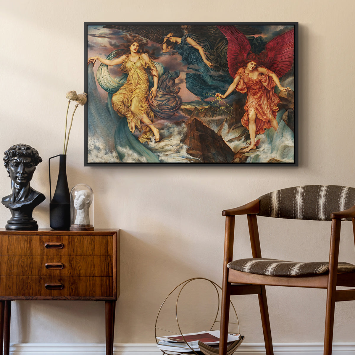 The Storm Spirits, 1900 by Evelyn De Morgan as a black floater framed canvas featuring a dynamic composition of figures embodying storm energy, styled above a mid-century console in a contemporary living area.