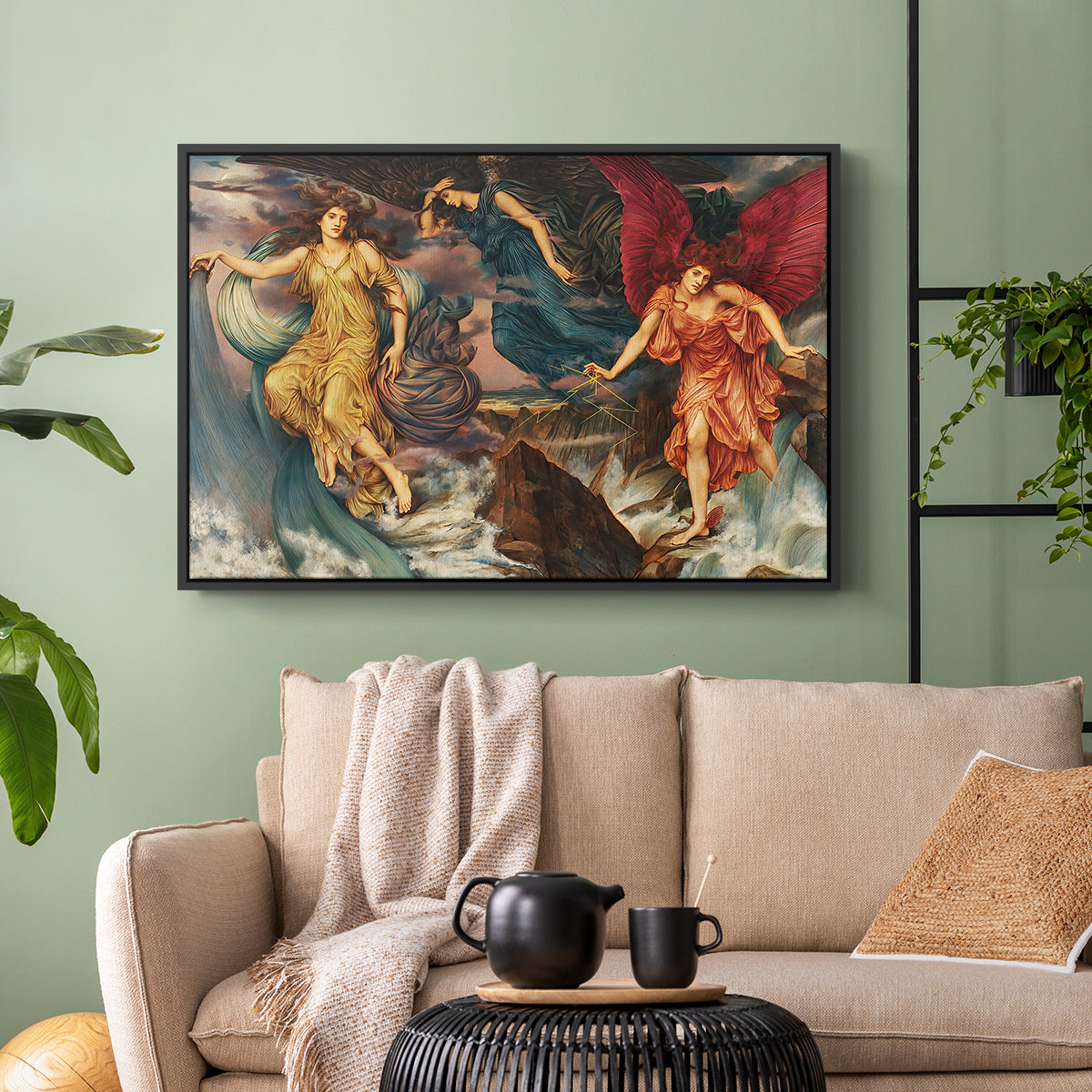 Black floater framed canvas featuring a symbolic scene of airborne figures in chaotic movement, displayed above a sofa in a modern living room.