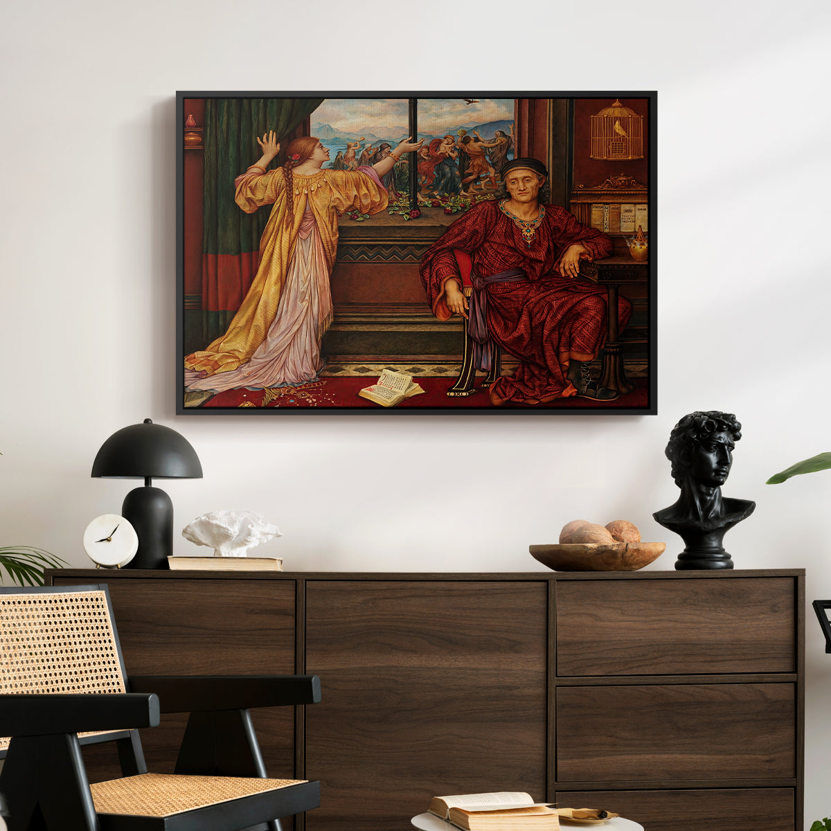 The Gilded Cage, c. 1901-1902 by Evelyn De Morgan displayed in a black floater framed canvas above a dark wood credenza in an entryway.