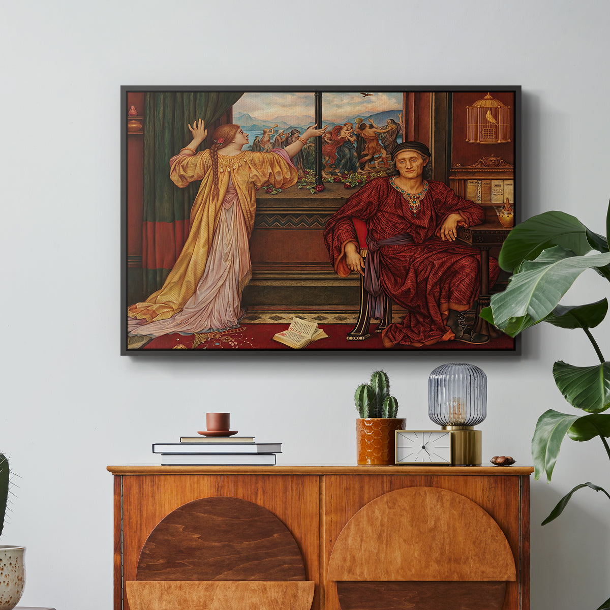 The Gilded Cage, c. 1901-1902 by Evelyn De Morgan in a black floater framed canvas featuring a woman seated inside ornate interior symbolizing confinement and luxury, displayed above a wood console cabinet.