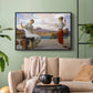 Black floater framed canvas featuring an elegant composition of women performing domestic task, displayed above a sofa in a modern living room.