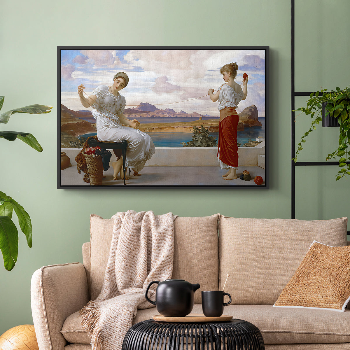 Black floater framed canvas featuring an elegant composition of women performing domestic task, displayed above a sofa in a modern living room.