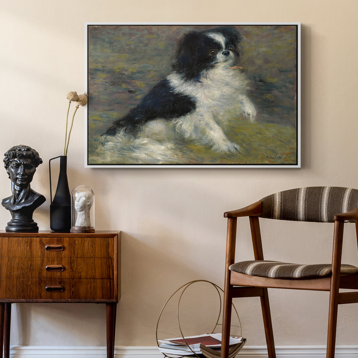 Tama, the Japanese Dog, c. 1876 by Pierre-Auguste Renoir as a white floater framed canvas featuring a close-up of a small dog in motion surrounded by rippling water, styled above a mid-century console in a contemporary living area.