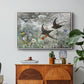 Common Swifts, 1886 by Bruno Liljefors in a white floater framed canvas featuring a flock of birds in flight soaring across open sky above landscape, displayed above a wood console cabinet.