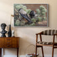 Hooded Crows (Kråkor), 1891 by Bruno Liljefors as a white floater framed canvas featuring a realistic scene of crows interacting on grassy terrain, styled above a mid-century console in a contemporary living area.